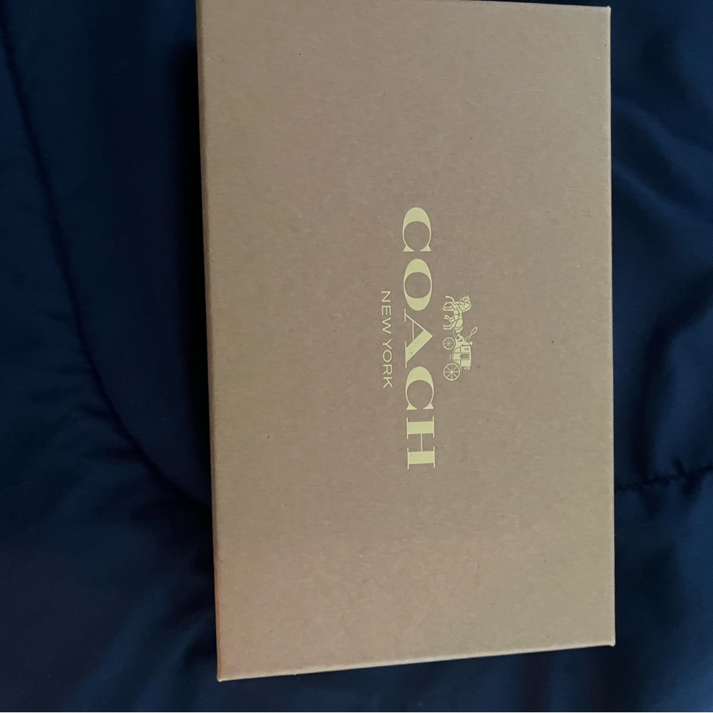 Used Coach purse -crossbody and new wristlet